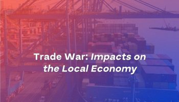 Promotional graphic for a Durham Workforce Authority blog titled “Trade War: Impacts on the Local Economy,” featuring a cargo ship, shipping containers and port cranes with a red and blue overlay.